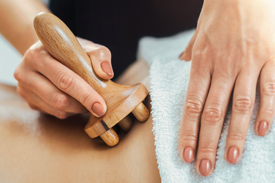person getting wood massage therapy oceanside ca